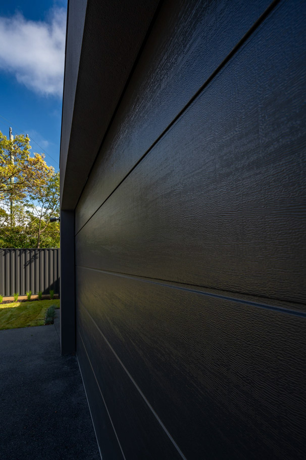 Close-up of a Flatline garage door in Night Sky