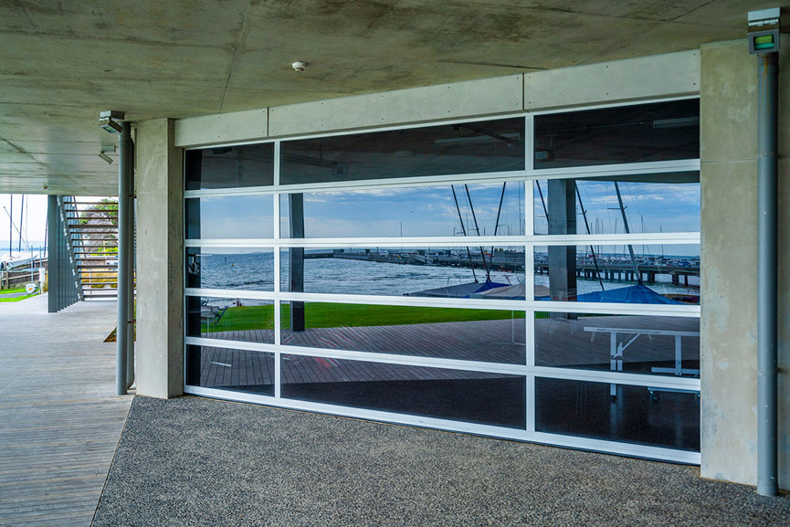 Garage door with clear glazed panels