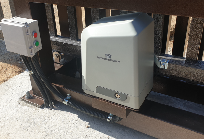 Electric gate motor and control buttons